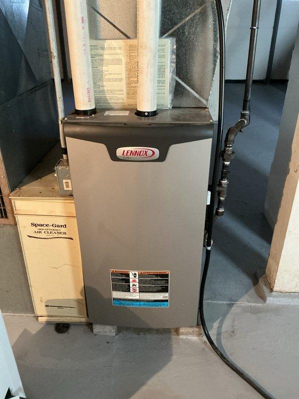 Performed routine maintenance on a Lennox HVAC system with attached Space-Gard Air Cleaner. Inspected and verified proper operation of furnace components, PVC intake/exhaust ventilation system, and associated plumbing infrastructure. System is functioning within normal parameters with no issues identified.