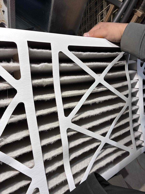Performed routine maintenance on HVAC system, including inspection and replacement of heavily soiled air filter. Unit identification confirmed via serial number S645257 on equipment tag. System functionality verified after service completion.