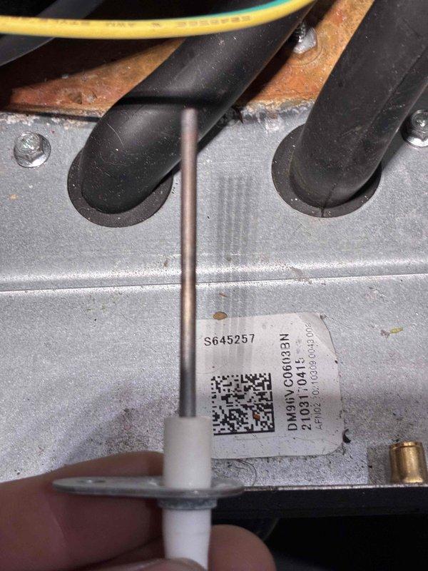 Performed routine maintenance on HVAC system, including inspection and replacement of heavily soiled air filter. Unit identification confirmed via serial number S645257 on equipment tag. System functionality verified after service completion.