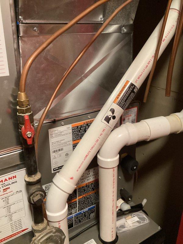 Successfully completed installation of a complete HVAC system featuring a new air handler unit with properly connected condensate drain system utilizing PVC piping with appropriate pitch and trap. Installed and pressure-tested all copper refrigerant lines, verified proper electrical connections, and ensured the unit was properly elevated off the floor for optimal airflow and drainage.