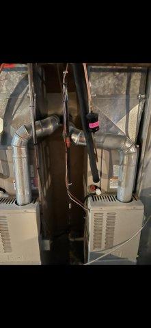 Responded to no heat complaint on dual furnace system. Discovered thermostat incorrectly set to cooling mode with 83°F reading while customer requested heat. Reset thermostat to heating mode, tested system operation, and confirmed both furnaces functioning properly.