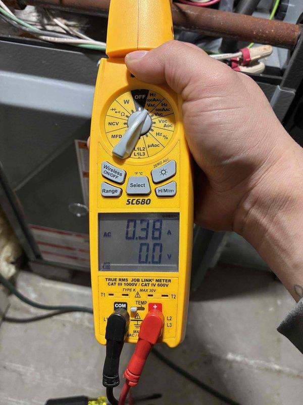 Performed routine HVAC system tune-up with comprehensive electrical diagnostics. Conducted amperage testing showing 0.38A and voltage measurements with readings of 536.6V using Fieldpiece SC680 meter. Inspected and verified proper electrical connections throughout system to ensure optimal performance and safety.
