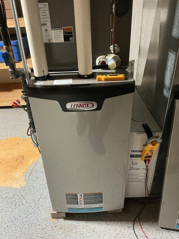 Performed seasonal tune-up on Lennox furnace system with Air Bear filtration. Inspected PVC venting, verified proper operation of all components, and confirmed system is functioning within manufacturer specifications. No issues detected with furnace or connected ductwork during this preventative maintenance service.