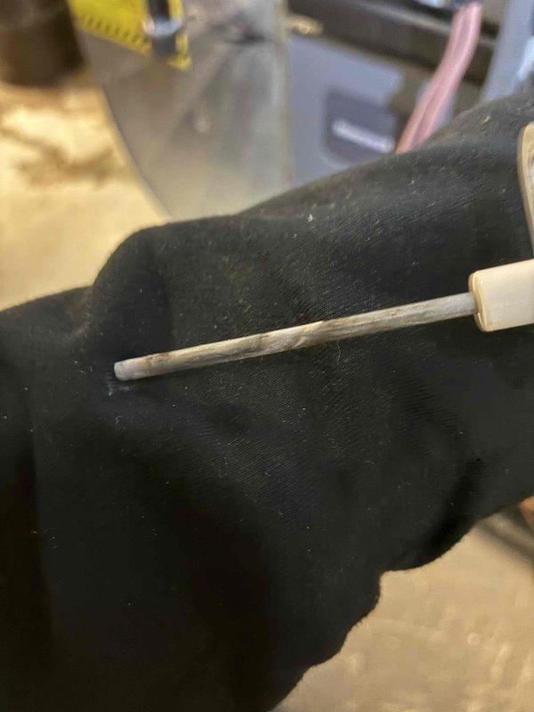 Diagnosed no-heat complaint on system less than 10 years old. Performed electrical testing with Fieldpiece SC680 multimeter, measuring approximately 1209 ohms through control circuit. Inspected temperature sensor probe installation in insulated line set to verify proper operation. System restored to normal heating function after completing diagnostic checks.