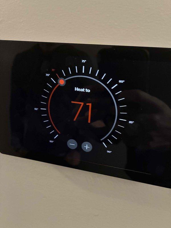 Performed routine furnace inspection and maintenance. Examined ductwork for dust accumulation and proper airflow. Confirmed thermostat functionality with heat setting at 71°F and verified system response to temperature adjustments.