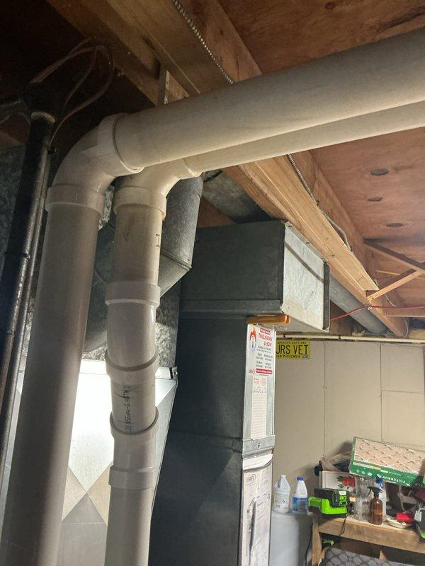 Performed routine HVAC tune-up service, including inspection of furnace blower wheel which showed moderate dust accumulation. Cleaned blower assembly to improve system efficiency and airflow. Examined PVC venting system and confirmed proper installation with no visible issues or leaks.