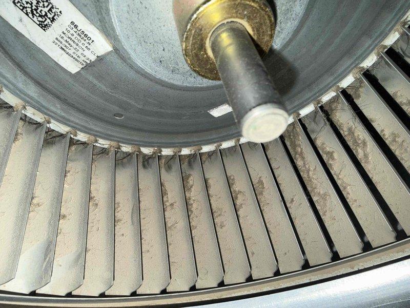 Performed routine HVAC tune-up service, including inspection of furnace blower wheel which showed moderate dust accumulation. Cleaned blower assembly to improve system efficiency and airflow. Examined PVC venting system and confirmed proper installation with no visible issues or leaks.