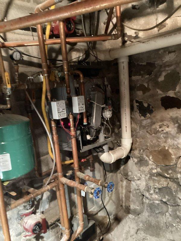 Performed comprehensive tune-up on residential boiler system. Inspected copper piping network, expansion tank, and control valves for proper operation. Conducted combustion analysis with Bacharach analyzer, confirming 91.2% efficiency with O2 at 5.1%, CO at 94ppm, and CO2 at 10.4%, all within acceptable parameters.