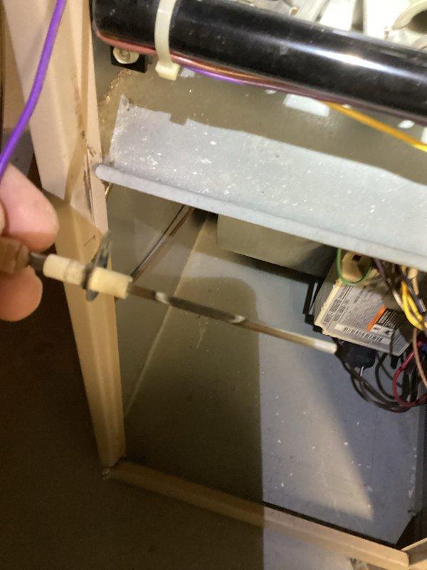 Performed routine maintenance on furnace system under service agreement. Inspected interior components including blower motor assembly, heat exchanger, and electrical connections. Noted dust accumulation on internal components and cleaned affected areas to ensure optimal system performance.