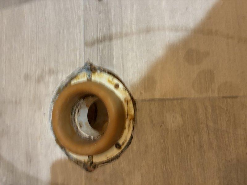 Replaced severely corroded toilet flange and wax ring that showed signs of leakage and water damage to surrounding flooring. Successfully installed and tested new toilet, ensuring proper seal and function with no further evidence of leakage.