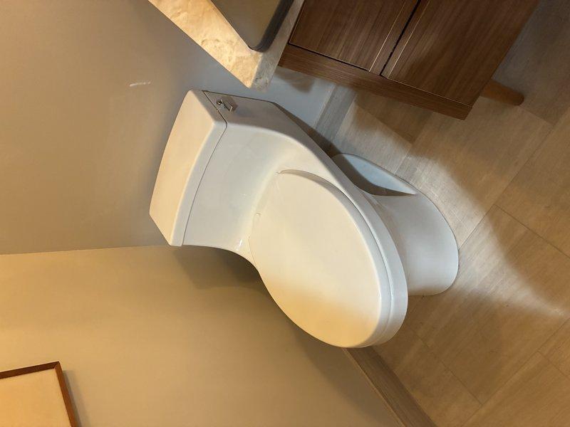 Replaced severely corroded toilet flange and wax ring that showed signs of leakage and water damage to surrounding flooring. Successfully installed and tested new toilet, ensuring proper seal and function with no further evidence of leakage.