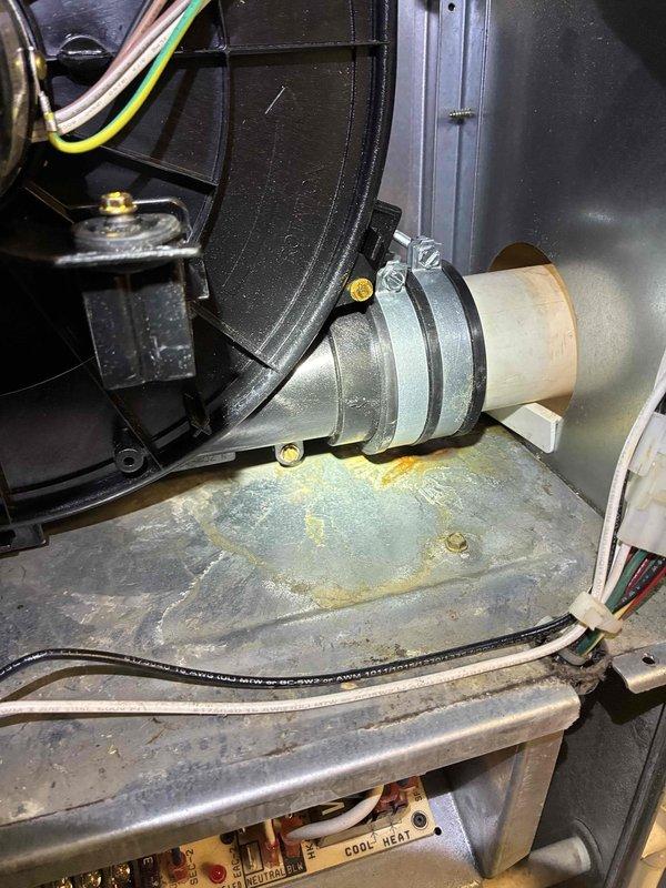 Performed comprehensive tune-up on aging HVAC system, identifying significant corrosion and water damage on the furnace base panel. Conducted electrical diagnostics using SC680 multimeter, which revealed capacitor reading of 6269 microfarads, indicating potential system inefficiency. Inspected blower assembly and ductwork connections for proper sealing and functionality.