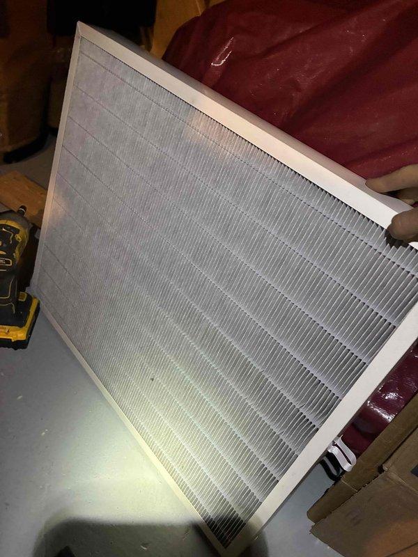 Performed routine HVAC tune-up service which included inspection and replacement of air filter with new pleated filter. Conducted electrical system diagnostics using SC680 multimeter, checking voltage readings (0.33V) at the control board to verify proper electrical connections and component functionality.