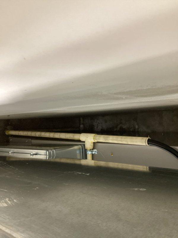 Completed installation of new furnace unit in crawl space. Installed necessary PVC venting and drainage pipes to manufacturer specifications. Conducted pressure testing with manometer, confirming proper gas pressure reading of 3.40" WC, ensuring optimal and safe system operation.