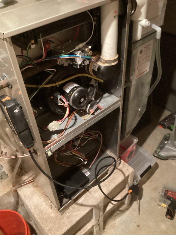 Performed routine maintenance tune-up on residential HVAC system, including inspection of furnace blower assembly, motor, and electrical connections. Examined gas piping system for proper installation and signs of corrosion. Cleaned accessible components and verified proper drainage through PVC condensate line.