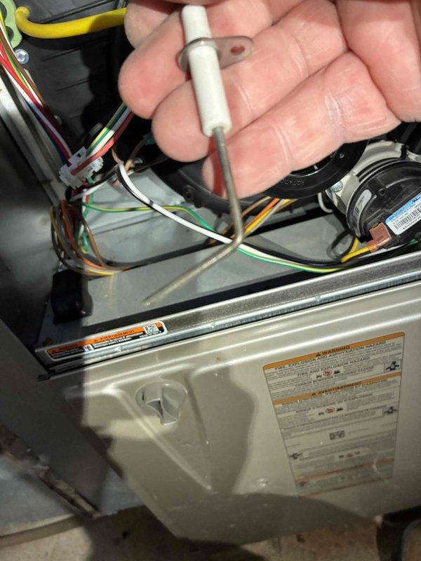 Performed routine maintenance on customer's furnace system. Inspected electrical components and wiring connections with testing probe, ensuring proper voltage readings and secure connections. Examined internal components including circuit boards and mechanical elements, with all systems verified to be operating within manufacturer specifications.