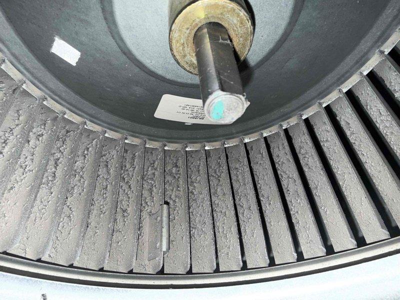 Performed comprehensive tune-up on HVAC system, including inspection and cleaning of the blower wheel which showed significant dust accumulation affecting performance. Examined and evaluated PVC condensate drainage system in utility area, confirming proper installation and function. Removed debris from mechanical components to improve system efficiency and prevent potential blockages.