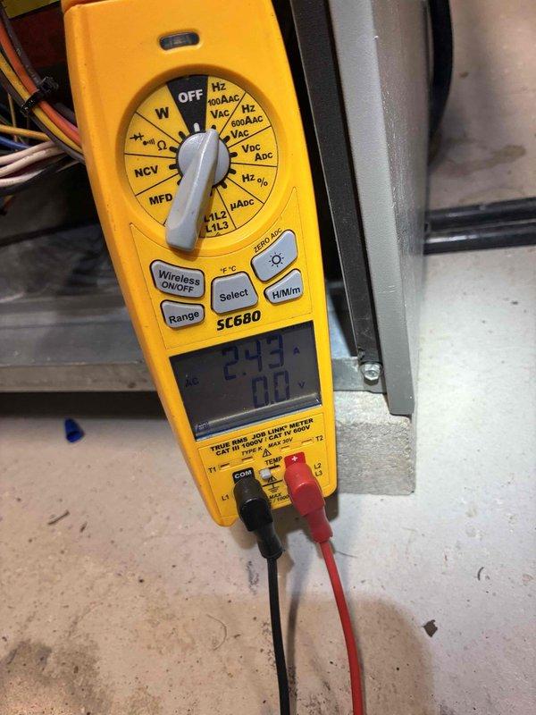 Performed scheduled HVAC maintenance service on residential system. Conducted complete electrical testing using SC680 multimeter, confirming proper amperage readings of 24.3 amps with normal voltage levels. Inspected gas line connections and ductwork in basement mechanical area, all components found in good working condition with no signs of leaks or safety concerns.