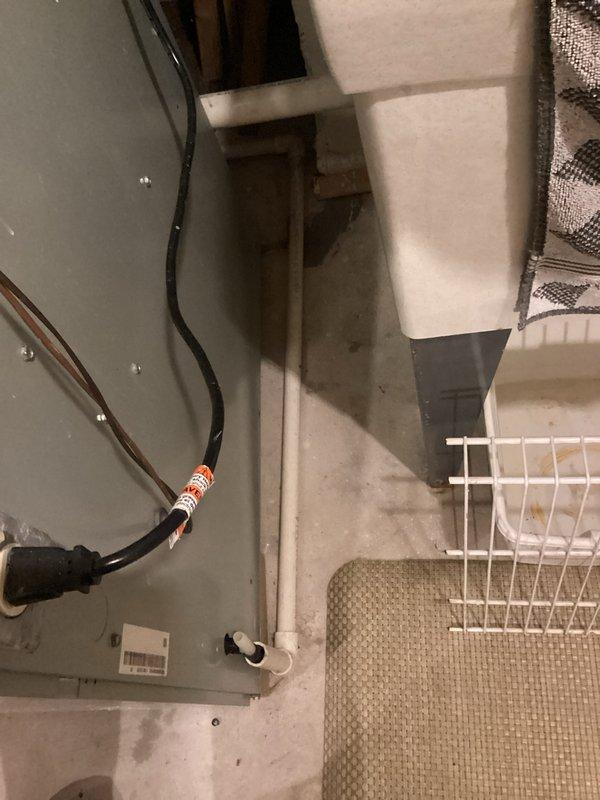 Performed comprehensive tune-up on HVAC system including electrical systems inspection. Utilized digital multimeter to test voltage and continuity of electrical components. Inspected mechanical room installation, verifying proper electrical connections and PVC condensate drainage. All measurements within manufacturer specifications; no issues detected.