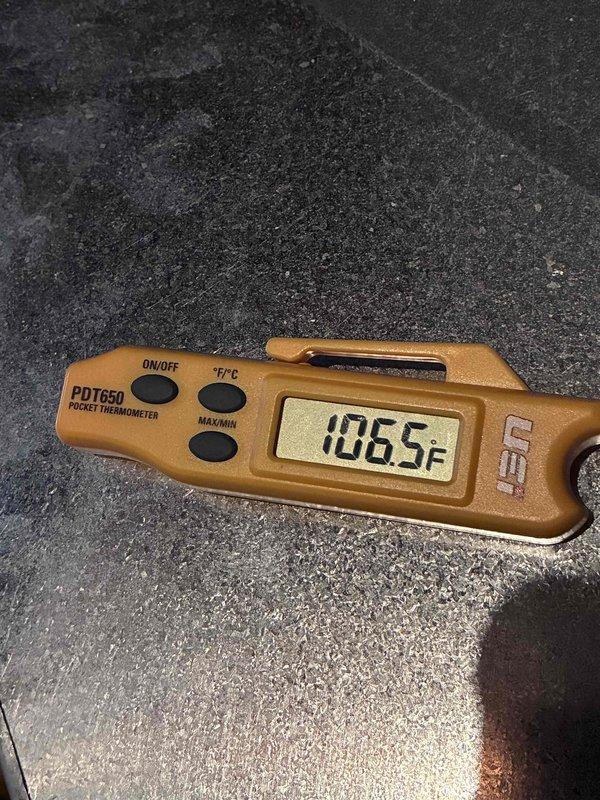 Conducted routine HVAC tune-up service with comprehensive system diagnostics. Performed temperature differential testing using PDT650 pocket thermometer, recording supply air temperature of 106.5°F, indicating proper system operation. Inspected internal components and verified sensor functionality to ensure optimal performance and efficiency.