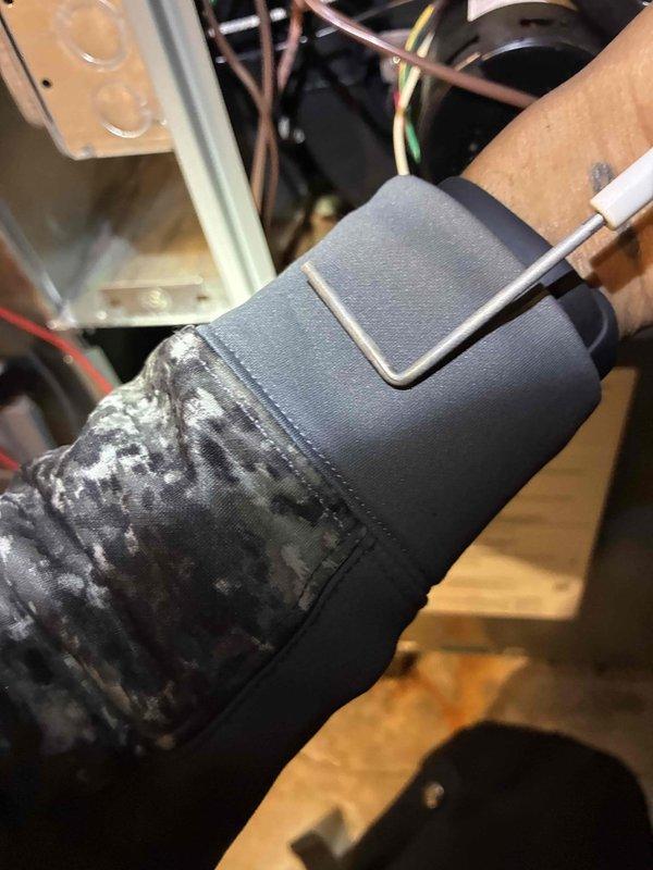 Performed scheduled prepaid HVAC maintenance inspection. Examined interior ductwork components for integrity, noting normal wear on galvanized metal surfaces. Inspected insulated ducting and verified proper sealing at connection points with temperature probe, observing appropriate insulation condition with no significant deterioration requiring immediate attention.