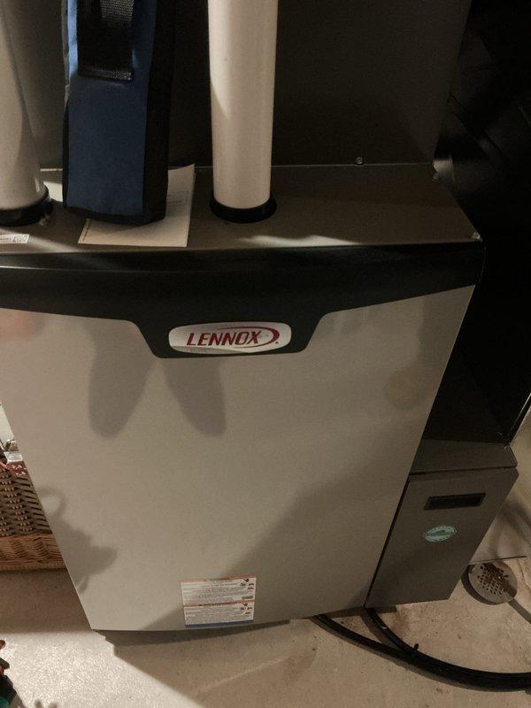 Performed seasonal tune-up on Lennox HVAC system. Inspected condensate drain assembly in attic and verified proper drainage with no blockages. Examined main unit in utility room, confirming all connections secure and system operating within manufacturer specifications.