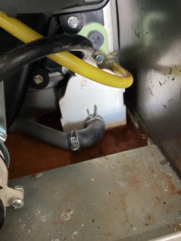 Performed routine preventative maintenance on residential furnace system. Inspected refrigerant lines, checked all electrical connections, and examined internal components with access panel open. System is operating within normal parameters with no immediate concerns identified.