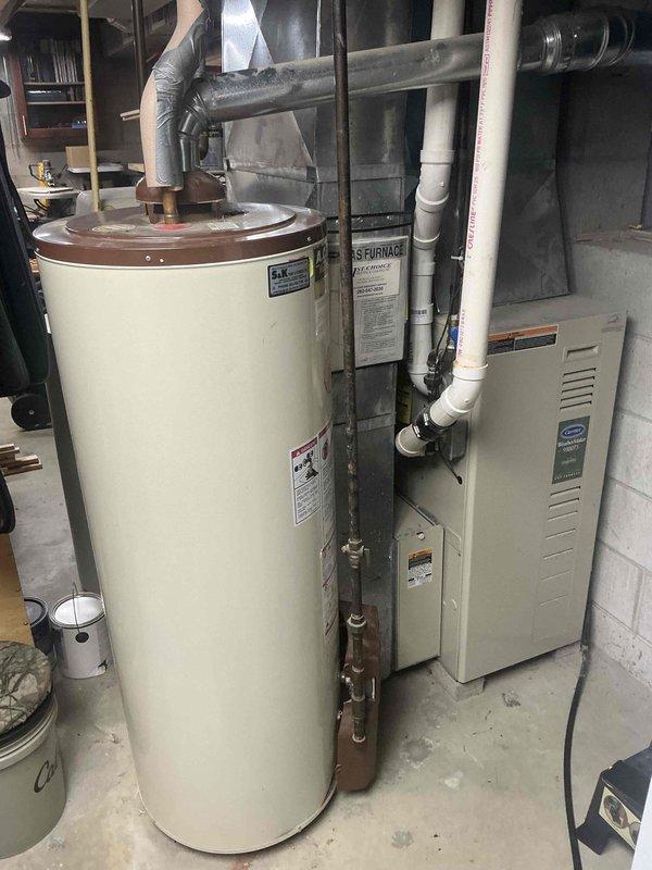 Conducted comprehensive inspection of residential HVAC system including furnace unit and associated ductwork in basement utility room. Evaluated system components for dust accumulation, airflow restrictions, and potential contamination sources. Recommended standard duct cleaning service to improve system efficiency and indoor air quality.