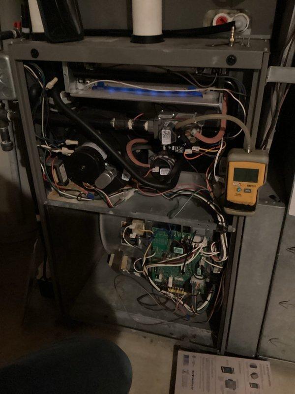 Performed comprehensive HVAC system tune-up including internal component inspection and combustion analysis. Diagnostic testing with Testo 310 gas analyzer confirmed 96.1% efficiency with acceptable CO levels (11 ppm) and proper oxygen/CO2 balance. System is operating within manufacturer specifications with all electrical connections and mechanical components verified functional.