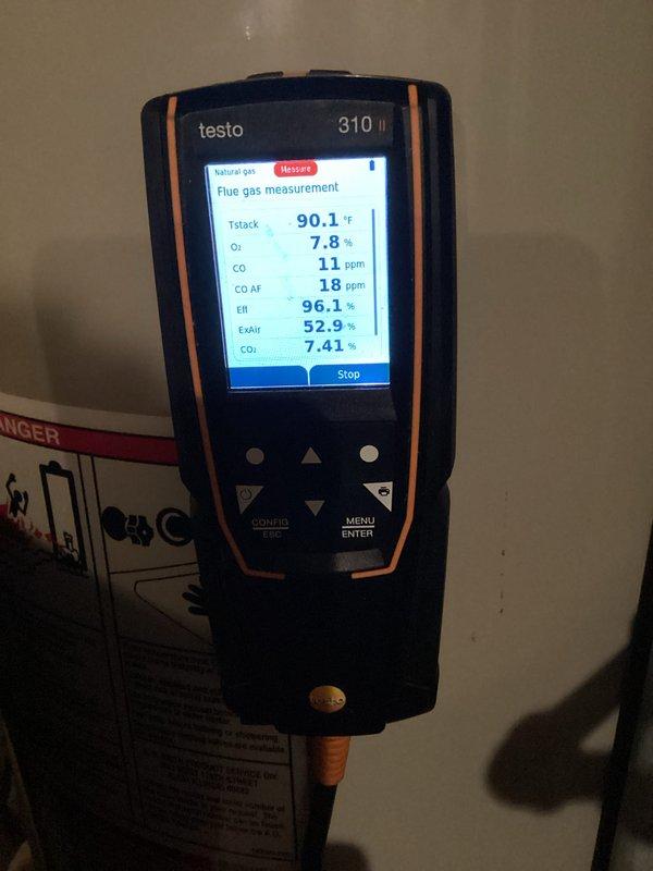 Performed comprehensive HVAC system tune-up including internal component inspection and combustion analysis. Diagnostic testing with Testo 310 gas analyzer confirmed 96.1% efficiency with acceptable CO levels (11 ppm) and proper oxygen/CO2 balance. System is operating within manufacturer specifications with all electrical connections and mechanical components verified functional.