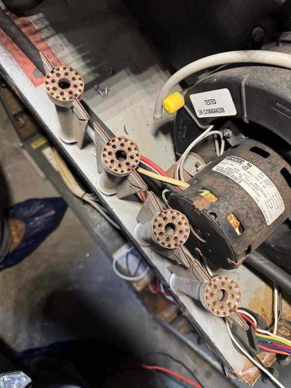 During routine HVAC tune-up, discovered a significant crack in the blower wheel housing that was affecting system performance. Inspected motor assembly and capacitors which showed normal dust accumulation but no electrical issues. Replaced damaged blower wheel assembly to restore proper airflow and system functionality.