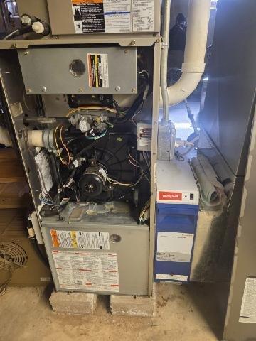Responded to a no-heat call for a newer furnace (under 10 years old). Upon inspection, found the blower motor had failed, causing system shutdown. Replaced the blower motor assembly, verified proper electrical connections, and tested system operation. Unit now functioning correctly with normal heat output and proper cycling.