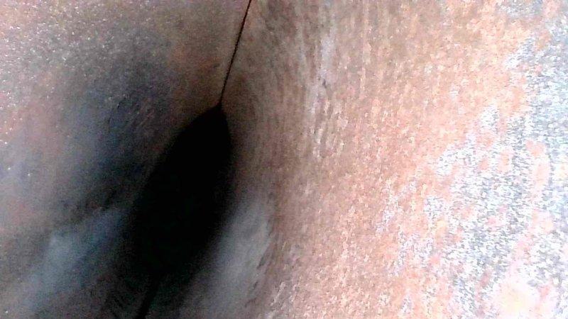 Performed routine tune-up on Armstrong Air HVAC system. Inspected and tested electrical connections (yellow, red, green, and white wiring), checked refrigerant lines, and noted minor condensation at unit base. Interior duct inspection revealed dust accumulation and early signs of oxidation that should be monitored in future maintenance visits.