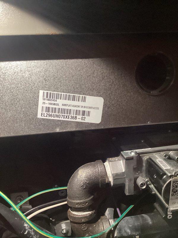 Performed routine maintenance on Lennox EL296UH070XE36B-02 furnace system. Inspected PVC venting configuration and connections for proper sealing. Checked electrical wiring and plumbing components, confirming all connections are secure and functioning correctly.
