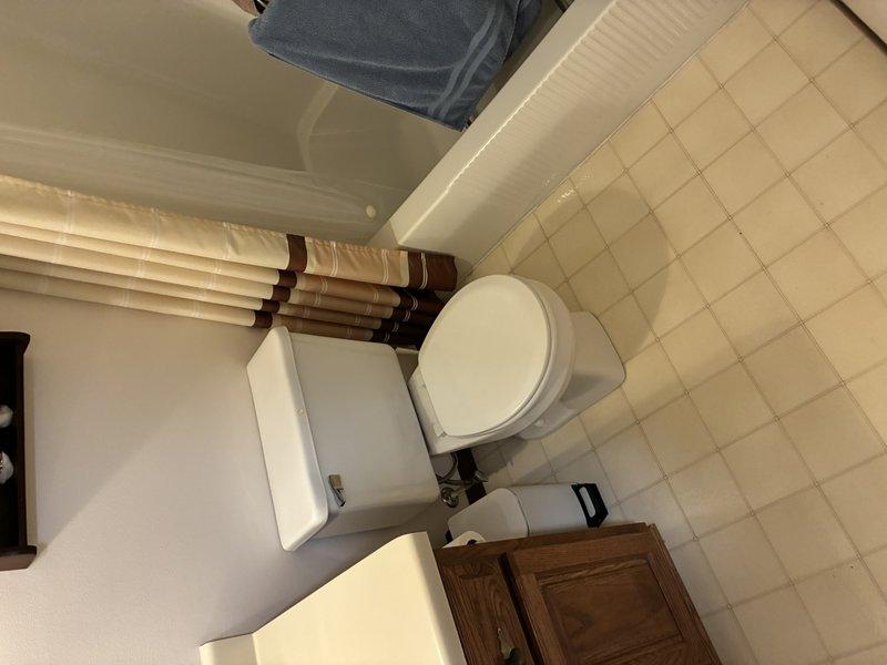 Inspected and serviced garbage disposal unit under kitchen sink. Verified connections to PVC drain system were secure and properly aligned. Confirmed unit was functioning correctly with no signs of leaks, damage or deterioration to any components.