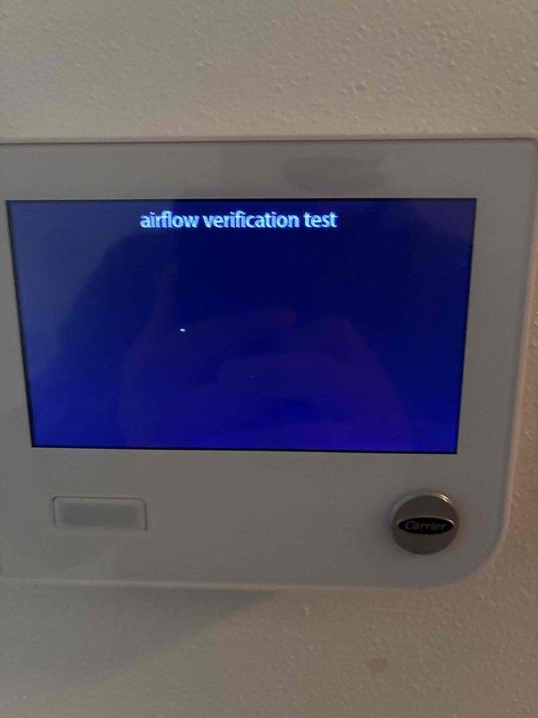 Performed routine maintenance on Carrier HVAC system including airflow verification testing. Confirmed proper system operation with digital thermostat functioning correctly. Advised customer about upcoming air filter replacement requirement as indicated by thermostat reminder notification.