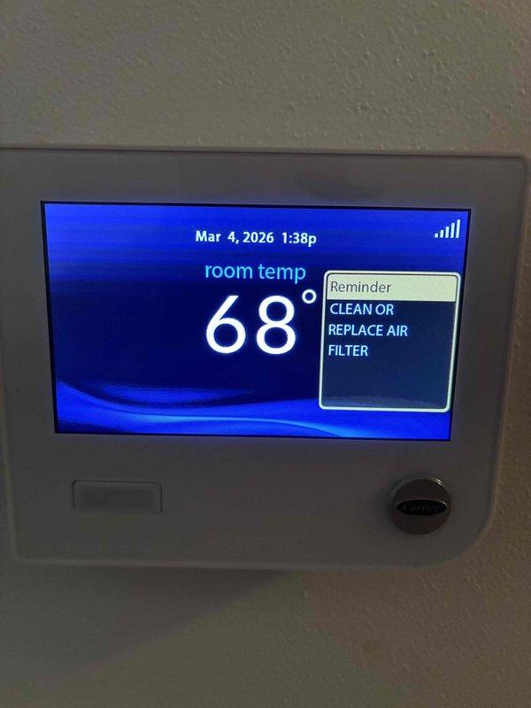 Performed routine maintenance on Carrier HVAC system including airflow verification testing. Confirmed proper system operation with digital thermostat functioning correctly. Advised customer about upcoming air filter replacement requirement as indicated by thermostat reminder notification.