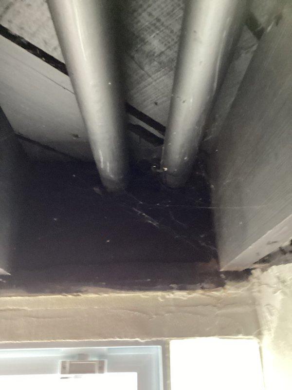 Completed installation of complete HVAC system including primary unit placement in utility area with proper electrical connections and PVC venting. System installation included running dual metallic supply/return lines through existing ductwork with appropriate sealing at junction points.