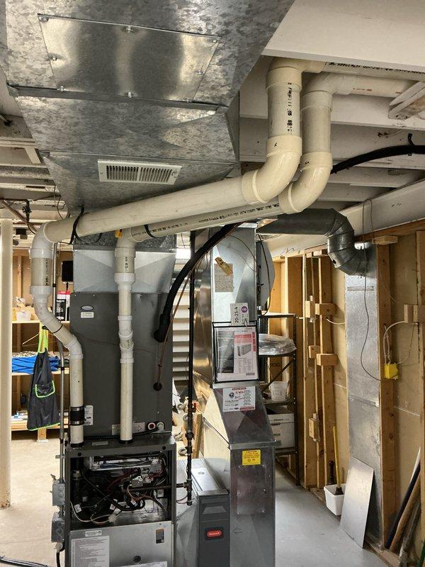 Performed annual maintenance on dual heating system. Conducted combustion analysis using Testo 310 II on natural gas unit, which showed excellent efficiency (95.7%) with proper CO levels (11 ppm) and good air/fuel mixture (CO₂ at 7.74%). Inspected complete installation including ductwork, PVC venting, and electrical connections - all components functioning within normal parameters.