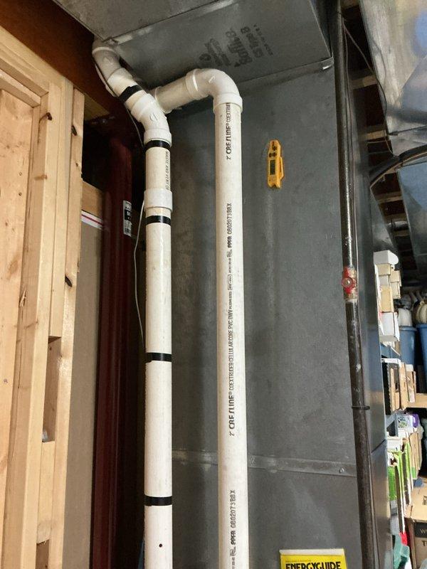 Performed comprehensive tune-up on aging HVAC system, documenting extensive corrosion on condensate drain lines and significant rust formation on the evaporator coil housing. Inspected PVC drain piping connections and identified deteriorating insulation on refrigerant lines that requires attention during next scheduled maintenance.