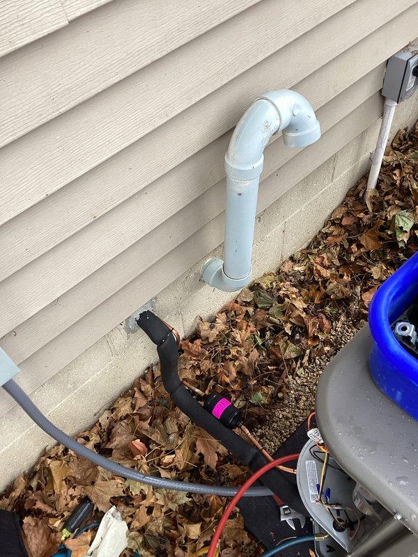 Completed installation of a new Lennox air conditioning system, including proper mounting of the outdoor condensing unit on a level pad adjacent to the home's exterior. Installed PVC condensate drain line with appropriate U-trap configuration and connected all electrical components via conduit to ensure code compliance. System was pressure tested, evacuated, and charged according to manufacturer specifications.