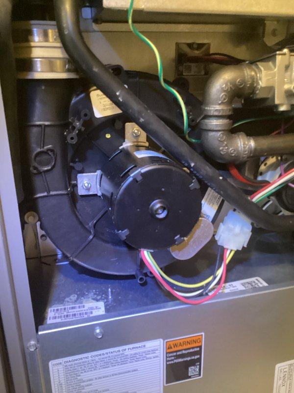 Performed comprehensive inspection of residential furnace system, accessing interior components to evaluate blower motor assembly, electrical connections, and exhaust ventilation. Visual inspection confirmed proper installation of all components with no signs of damage, abnormal wear, or operational issues. System was returned to service in normal working condition with all safety features verified.