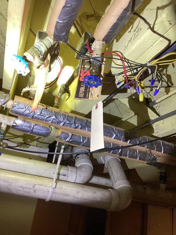Performed visual inspection of residential boiler system, examining copper supply/return lines and associated connections throughout crawlspace. Checked insulation integrity on distribution ductwork and verified proper installation of control wiring to thermostat and zone valves. All components appear to be functioning within normal parameters with no visible leaks detected.