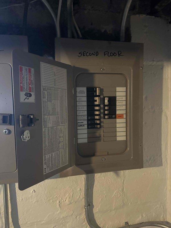 Conducted comprehensive inspection of electrical circuit breaker panel and HVAC system in basement utility area. Evaluated existing furnace/air handler unit with associated ductwork and water heater installation for replacement estimate. Documented current system configuration and electrical service capacity to determine appropriate replacement options.