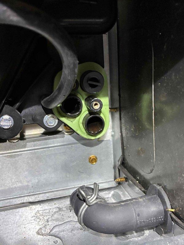 Conducted routine HVAC tune-up service including inspection of refrigerant ports and connections at the service valve assembly. Performed electrical diagnostics using multimeter, verifying proper voltage readings of 10.2V across control circuit components and confirming system is operating within manufacturer specifications.