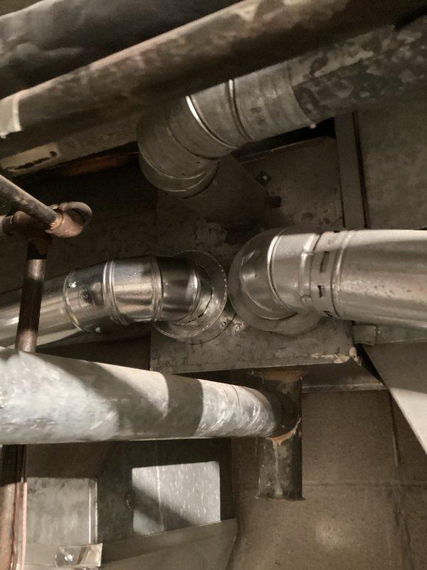 Successfully installed a complete HVAC system including properly routed and secured galvanized ductwork throughout the utility space with all required manufacturer documentation attached. Installed and connected dual Lennox heating units with copper supply lines, ensuring all components were properly labeled with warranty information and operational instructions for future reference.