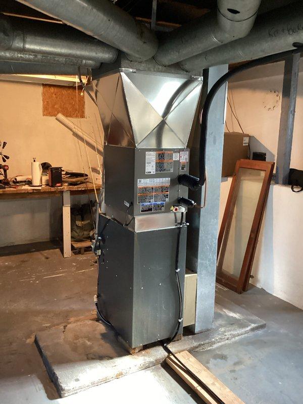 Successfully installed new AC condensing unit on concrete pad with proper electrical connections to service disconnect. Installed matching evaporator coil on existing furnace with new refrigerant lines and completed system start-up and testing. All ductwork connections were properly sealed and system is operating within manufacturer specifications.