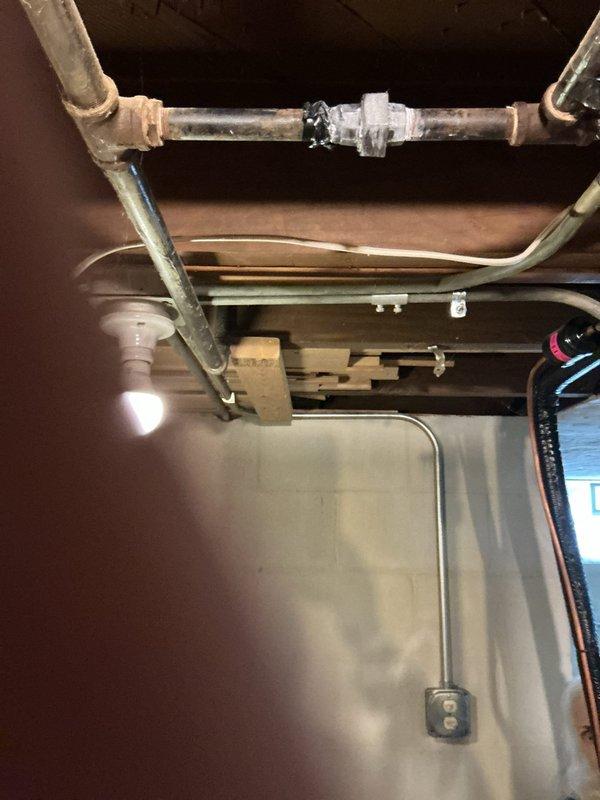 Performed routine maintenance on Rheem HVAC system as part of prepaid maintenance visit. Inspected furnace components, connections, and ventilation system including the PVC exhaust pipes. Identified and reinforced pipe joint connection with appropriate sealant to prevent potential leaks in the utility area plumbing infrastructure.