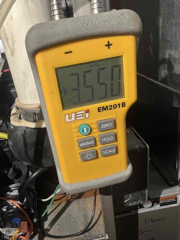 Performed gas pressure testing on the HVAC system using a UEI EM201B diagnostic meter, taking measurements at both low and high settings (1503 InWc and 3550 InWc respectively). Verified proper gas flow and pressure readings within manufacturer specifications to ensure optimal system operation and safety compliance.