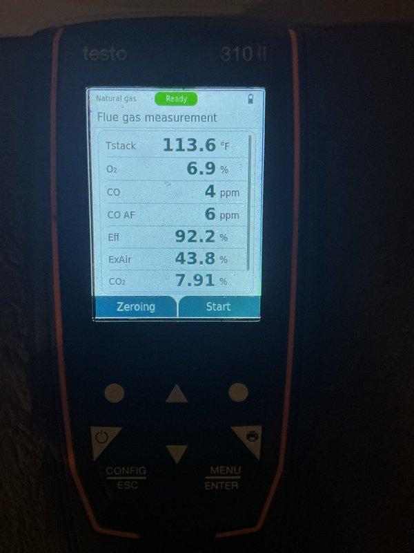Performed scheduled maintenance on HVAC system. Inspected PVC condensate drainage pipes for proper installation and function, noting minor buildup at connection points. Conducted combustion analysis using Testo 310 II analyzer, confirming system is operating at 92.2% efficiency with excellent emissions readings (CO at 4ppm) and proper stack temperature of 113.6°F.